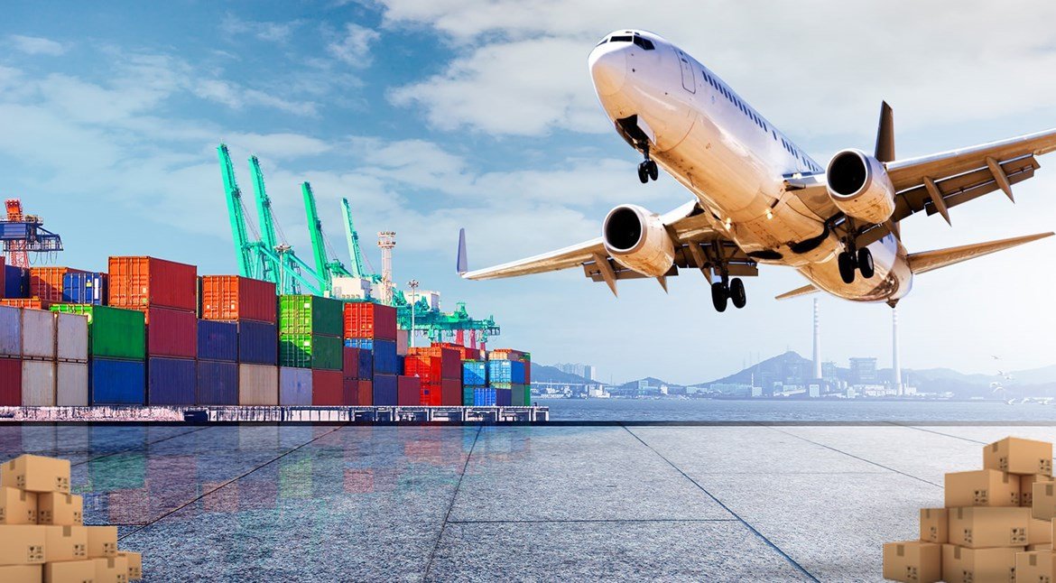 Air freight cargo plane landing over an international container terminal